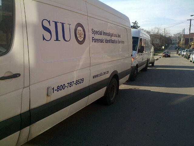 A van with the decals of Ontario's Special Investigations Unit